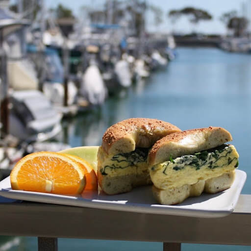 Breakfast sandwich in front of harbor