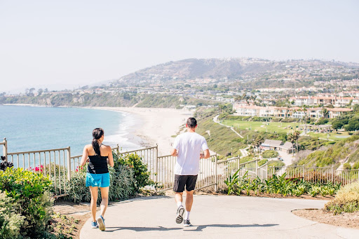 Two people running along the Strands to Salt Creek Beach trail